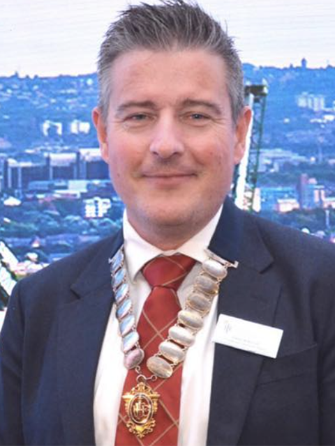 Portrait photograph of academic visitor to the School of Architecture, Building and Civil Engineering at Loughborough University, Peter Wilkinson